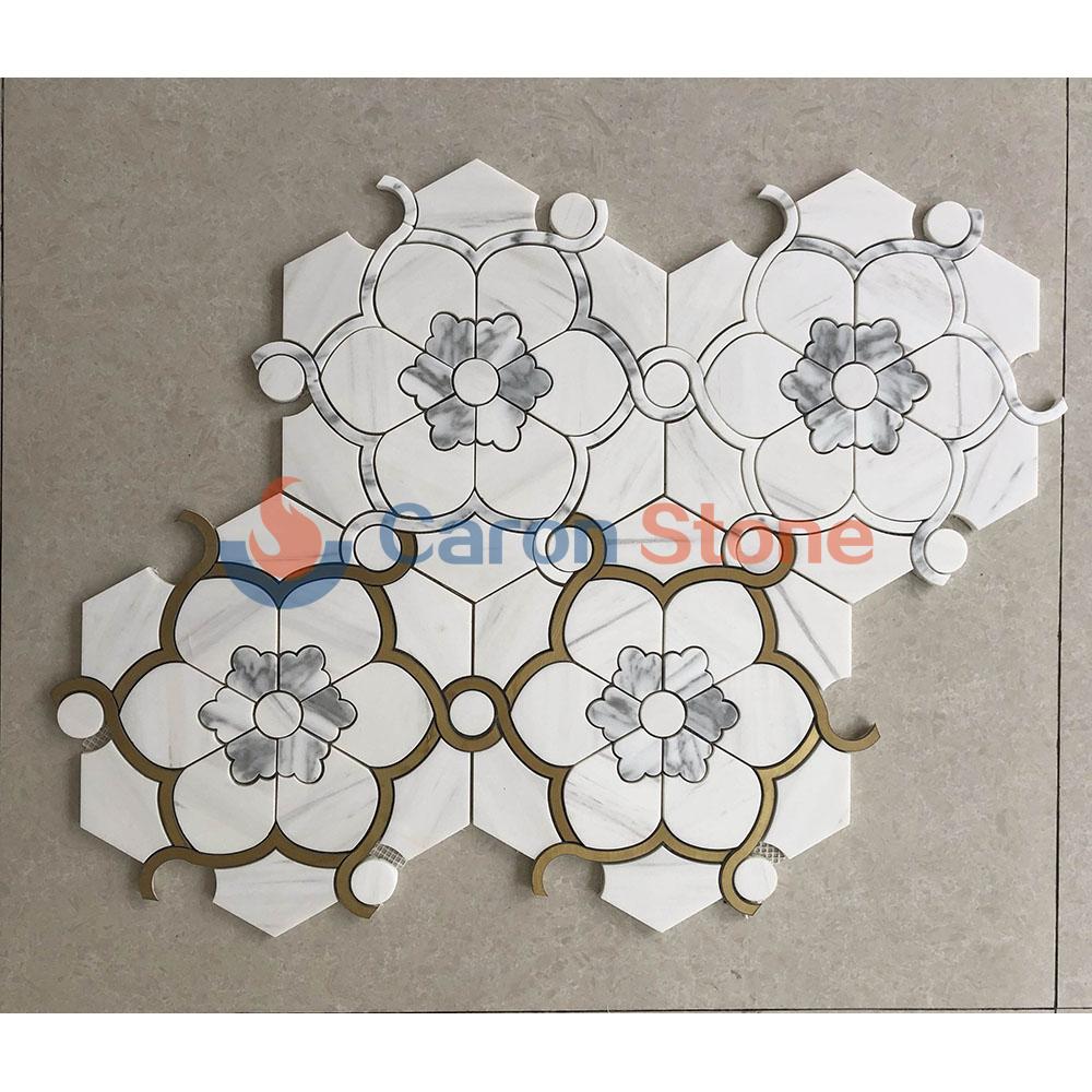 Grey and white marble mosaic with metal