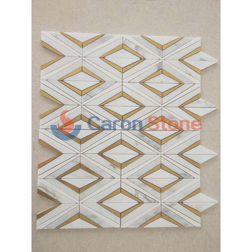 White marble with brass waterjet mosaic