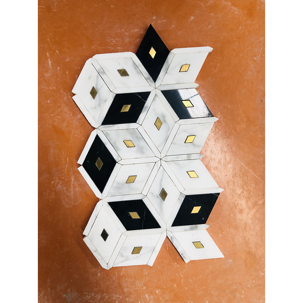 Black and white marble with brass rhomboid  mosaic parallelogram design